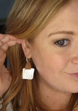 Geometric hammered earring with leather accent